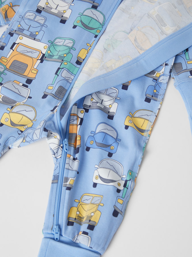 sleepsuit with vehicle print and fold-over cuffs