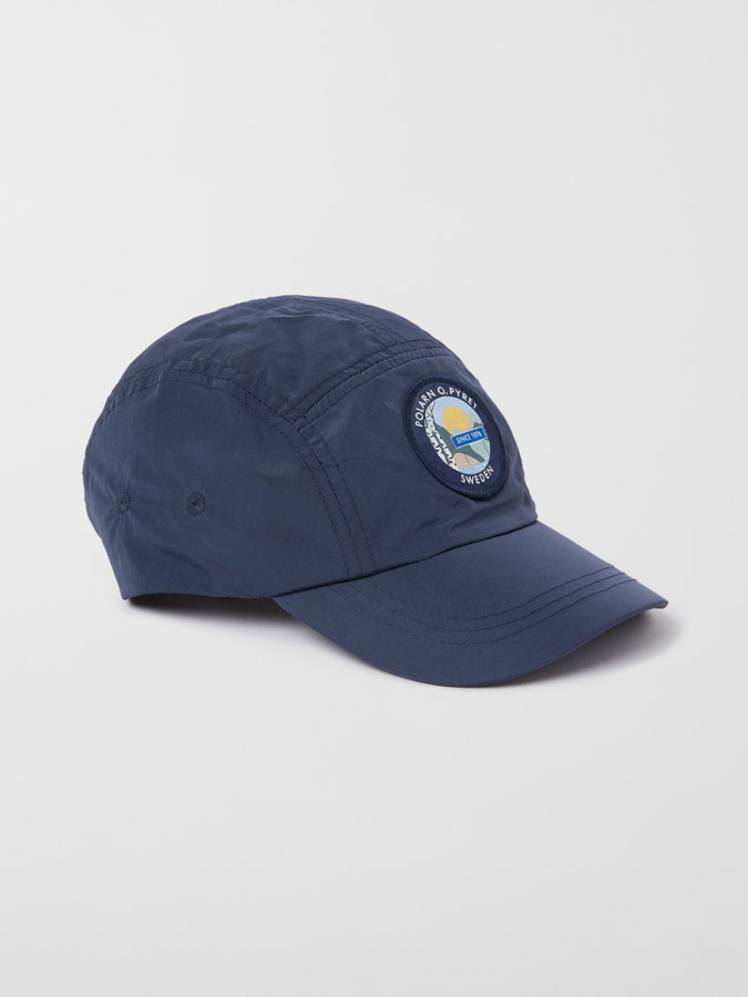 Water-repellent cap in solid color