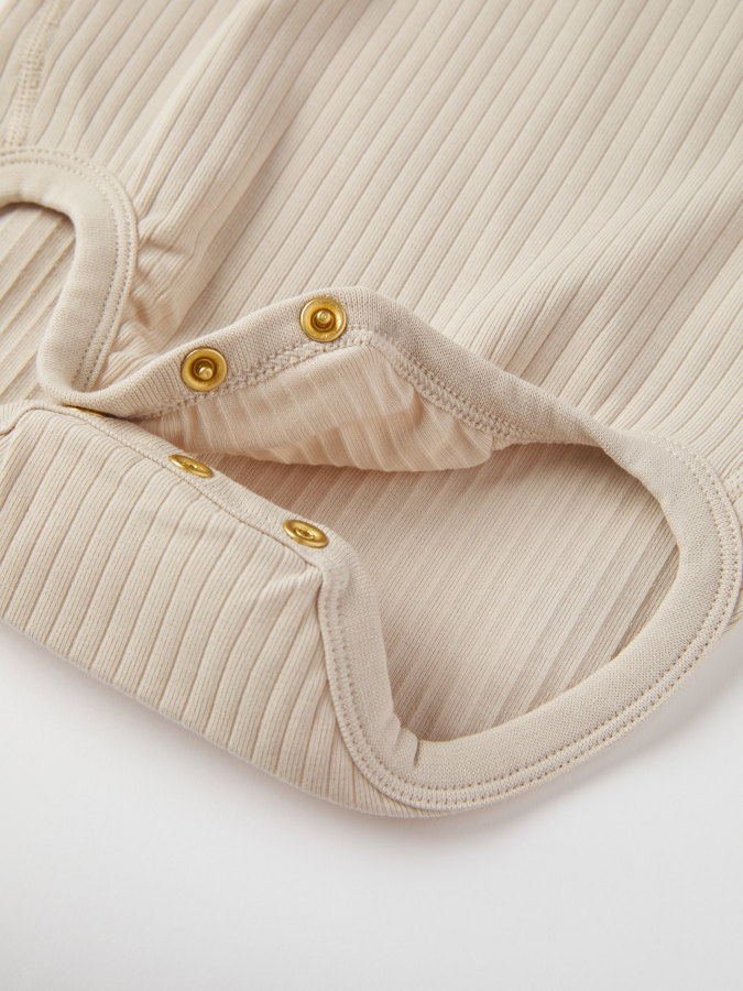 Ribbed babygrow with sun appliqué