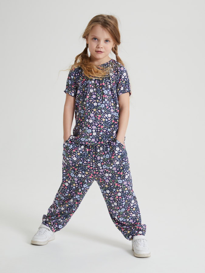 Trousers in viscose with floral print 
