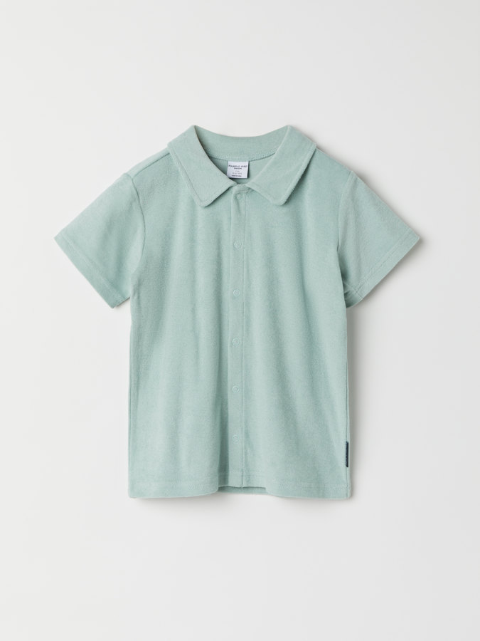 Short-sleeved, solid color terry shirt Short-sleeved, solid color terry shirt