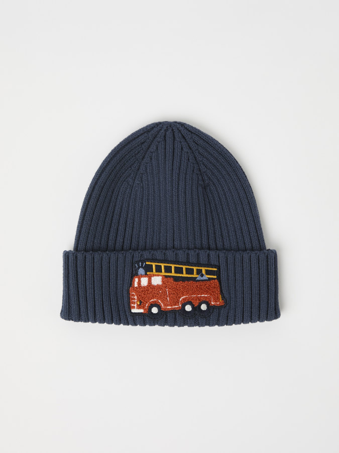 Solid color, ribbed beanie with appliqué