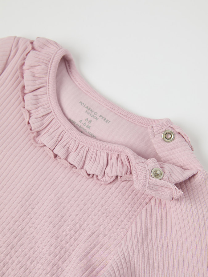 Solid color, ribbed babygrow with ruffles