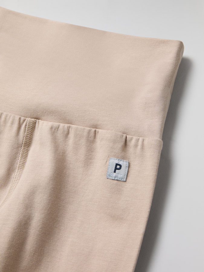 Solid color pants with fold-down cuffs