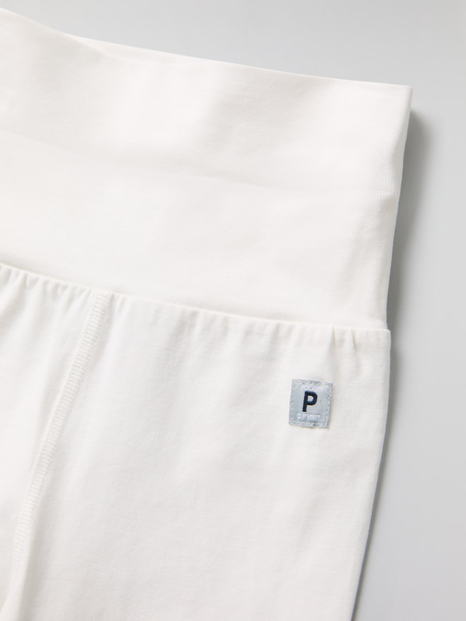 Solid color pants with fold-down cuffs