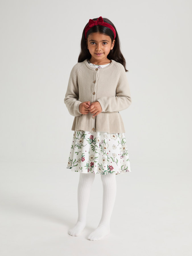 Knitted cardigan with ruffles