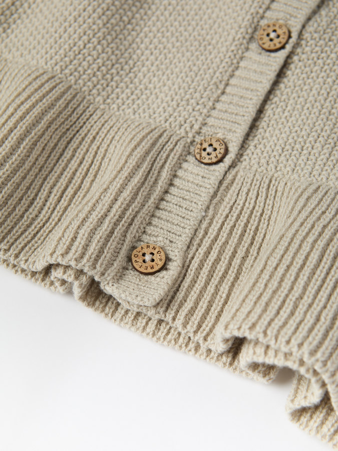 Knitted cardigan with ruffles