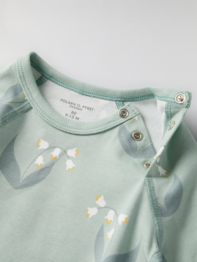 Extendable babygrow with lily of the valley print