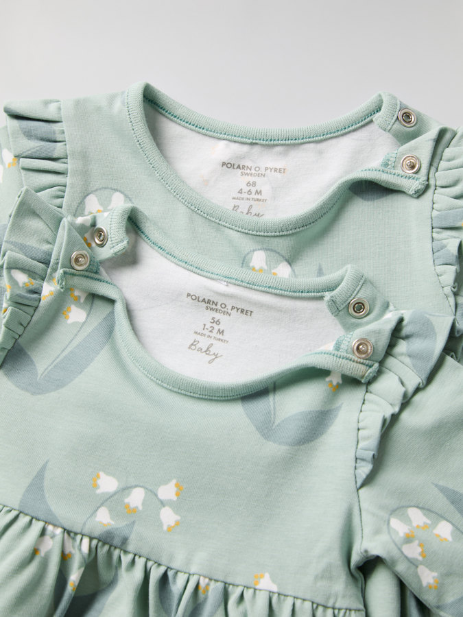 Dress with lily of the valley print and ruffles
