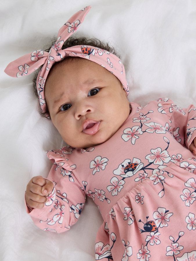 babygrow dress with cherry blossom print
