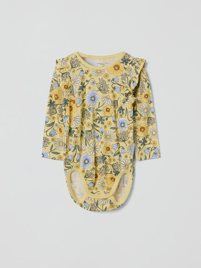 Floral babygrow with ruffles