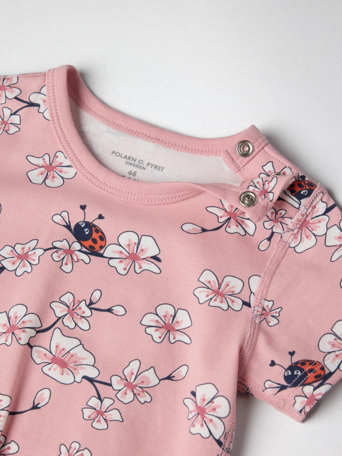 Short-sleeved babygrow with cherry blossom print