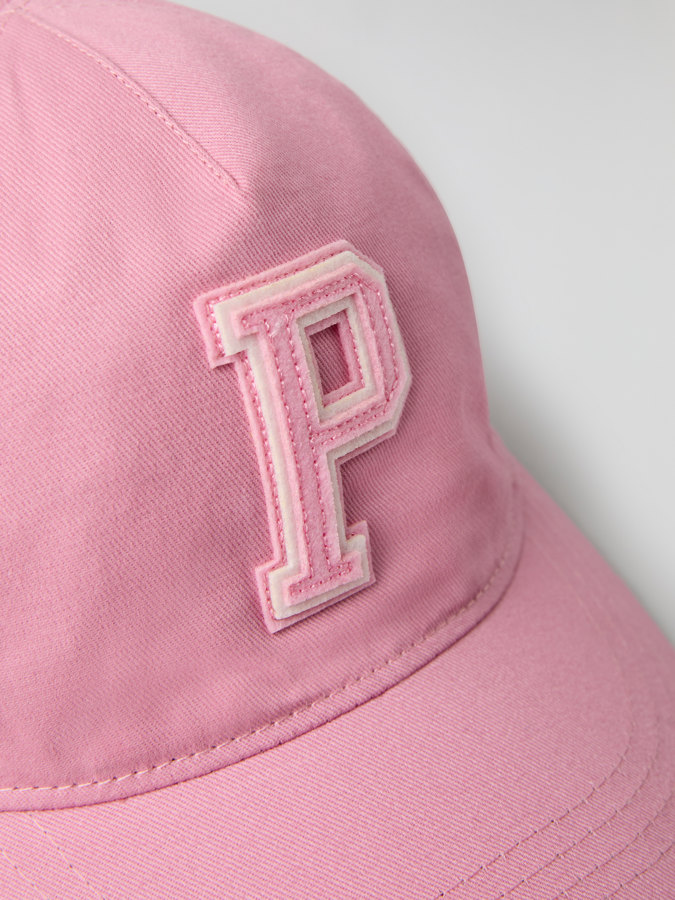 Cap with "P" appliqué
