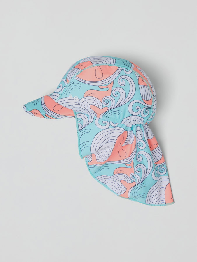 UV cap with neck flap and whale print