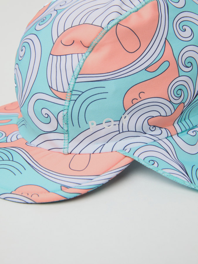 UV cap with neck flap and whale print