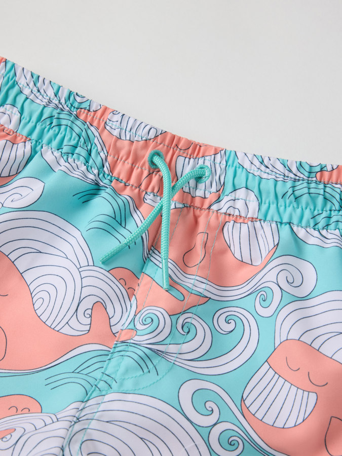 Swim shorts with whale print