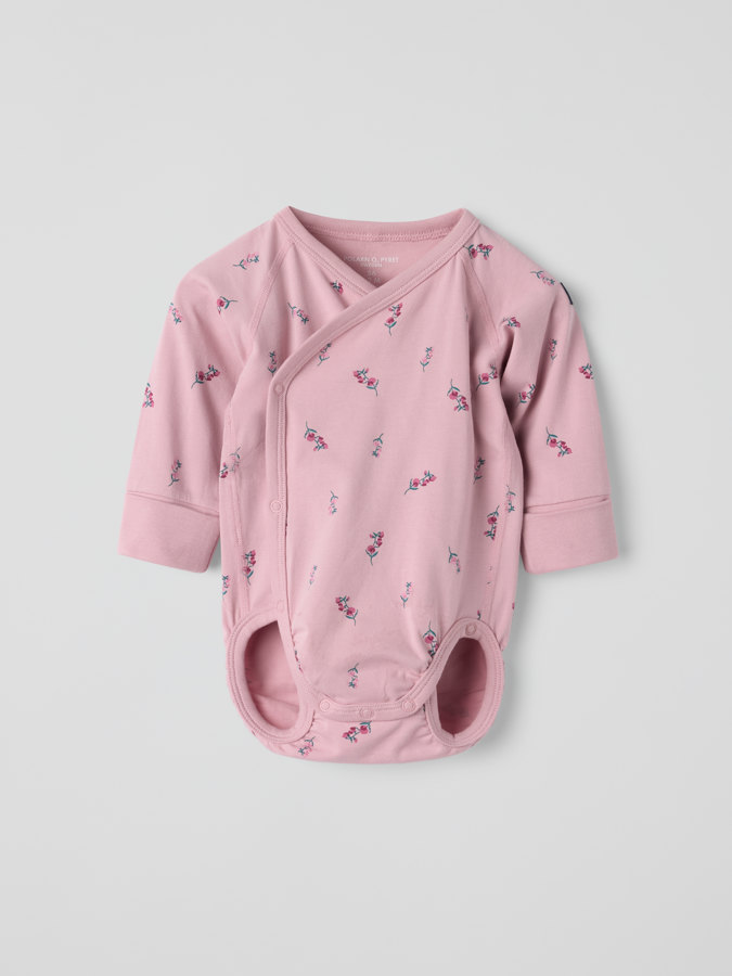Extendable wrapover body floral
