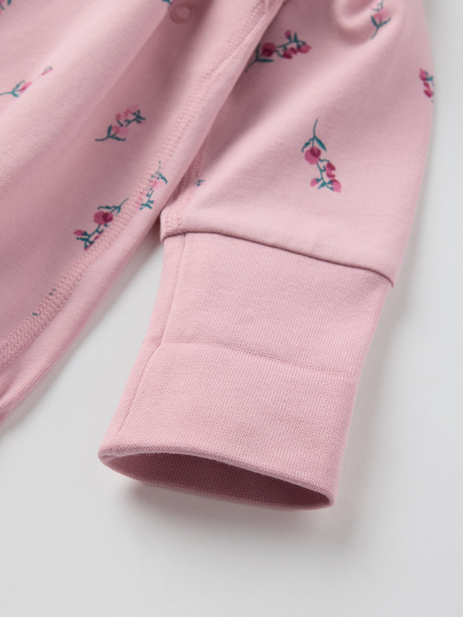 Extendable wrapover body floral